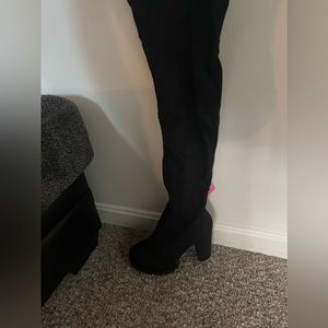 Black suede knee high boots. Brand new tags still attached